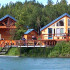 Photo of Cabins in front of river